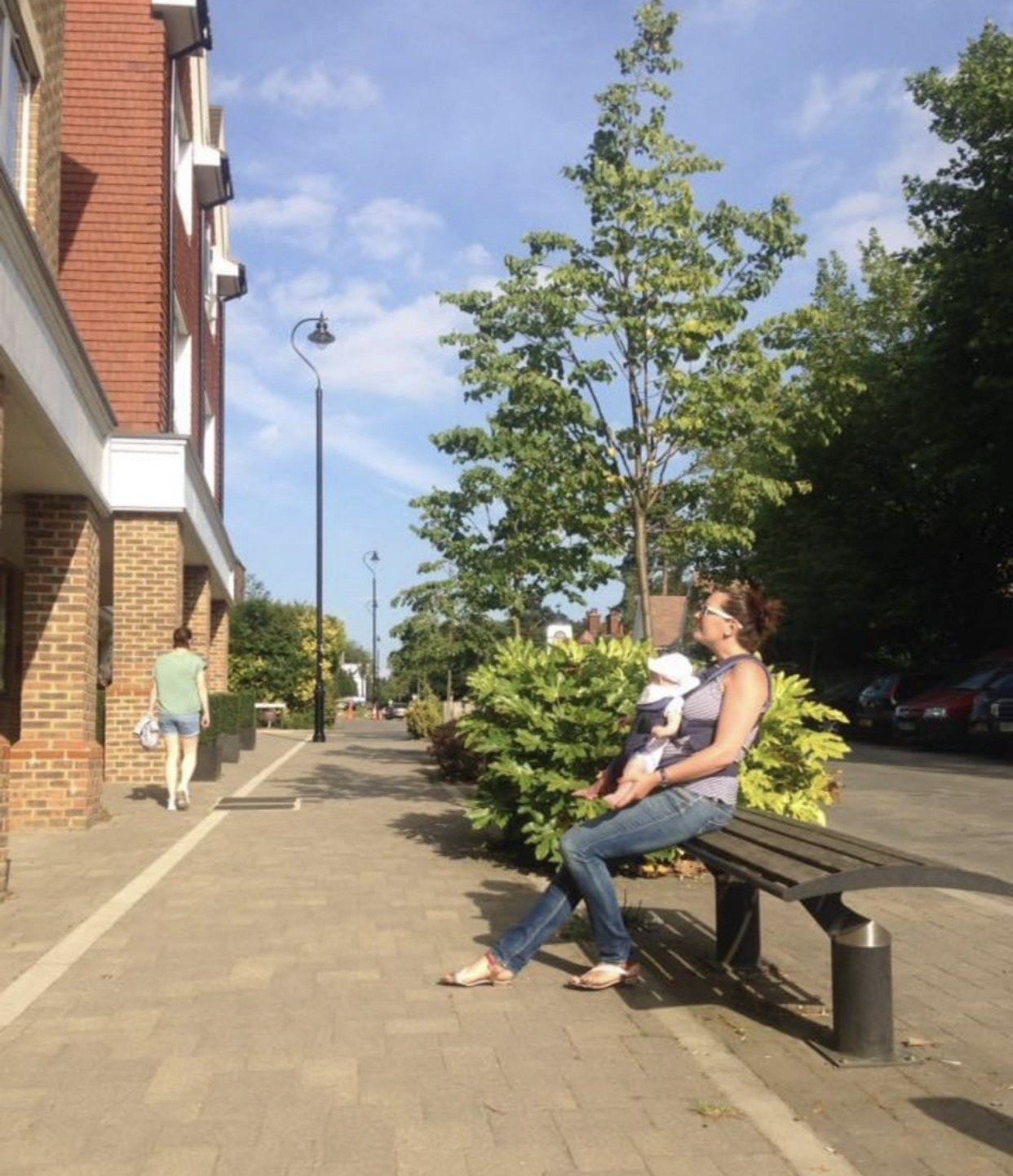 New street trees and seating along the pavement in Hindhead
